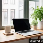 Home 20 의식적 기술 사용과 에너지 관리 - A bright, cozy home office scene bathed in natural sunlight streaming through a large window, illumi...